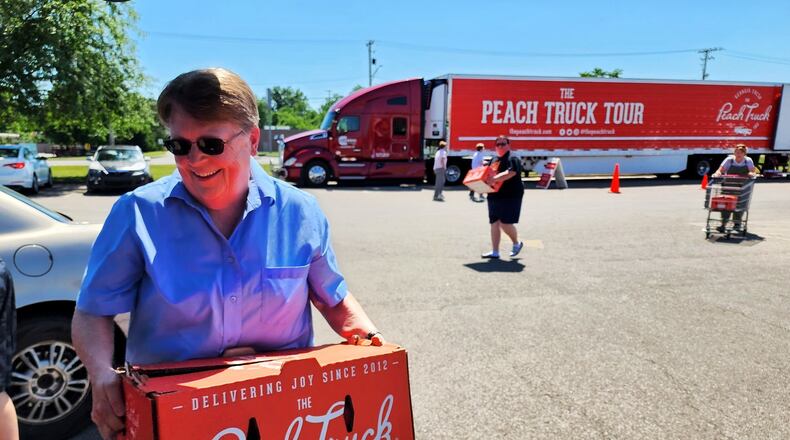 Nashville’s Peach Truck has kicked off its summer tour with several stops scheduled right here in the Miami Valley. PHOTO BY NICK GRAHAM/STAFF