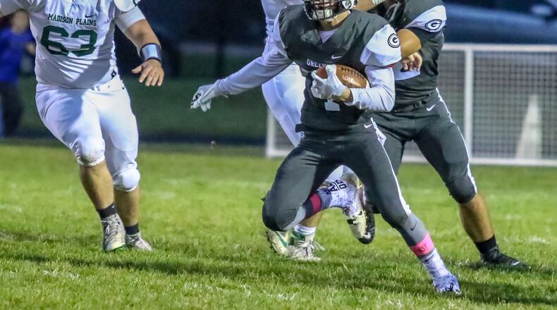 Greenon High School wide receiver Arlie Benson, Jr. finds an opening during their game against Madison Plains on Friday night at Greenon Stadium. The Knights won 24-16. CONTRIBUTED PHOTO BY MICHAEL COOPER