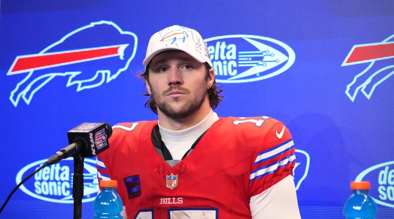 Buffalo Bills' Josh Allen pauses during a news conference after an NFL football game against the Philadelphia Eagles, Sunday, Dec. 28, 2025, in Buffalo, N.Y. (AP Photo/Gene J. Puskar)
