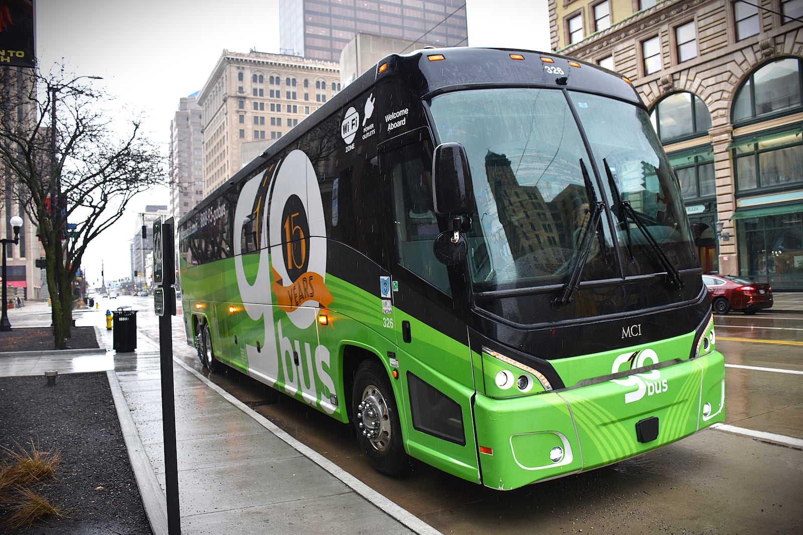 A GoBus motor coach parked at a bus stop in downtown Dayton on March 5, 2026. GoBus has launched new bus service connecting Dayton, Middletown, Oxford, Springfield and Yellow Springs to many other Ohio cities. CORNELIUS FROLIK / STAFF