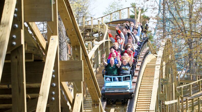 Ride enthusists enjoy the wooden roller coaster, Mystic Timbers, at Kings Island. GREG LYNCH / STAFF