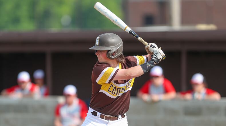 Kenton Ridge High School senior Keller Fultz awaits a pitch during their Division II district semifinal game against Tippecanoe on Tuesday evening at Tom Randall Field in Springfield. The Cougars won 4-2. CONTRIBUTED PHOTO BY MICHAEL COOPER