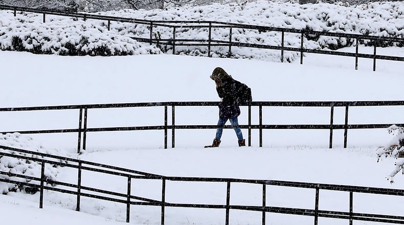 A Wiittenberg University student walk across campus in the snow last year. Bill Lackey/Staff