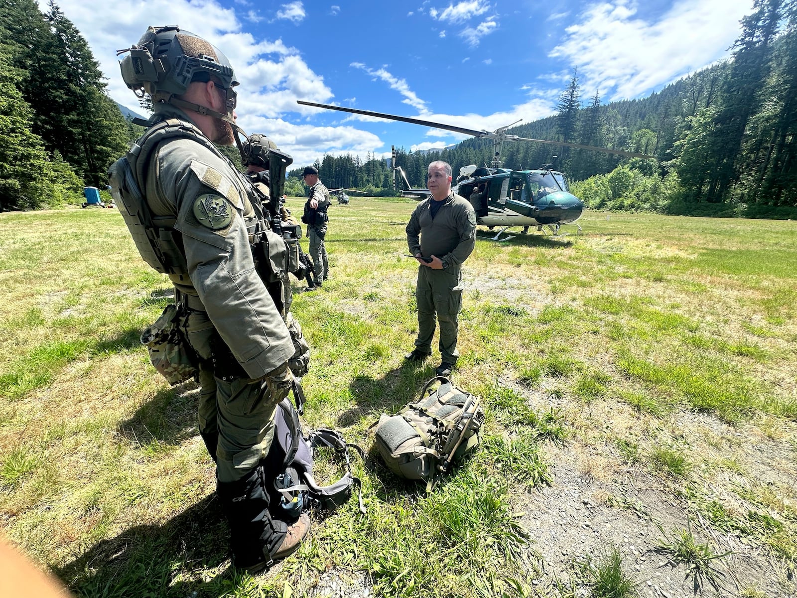 In this handout photo provided by the Snohomish County Sheriff's Office deputies participate in the search for Travis Decker, at an undisclosed location in Washington state, Friday, June 6, 2025. (Snohomish County Sheriff's Office photo via AP)
