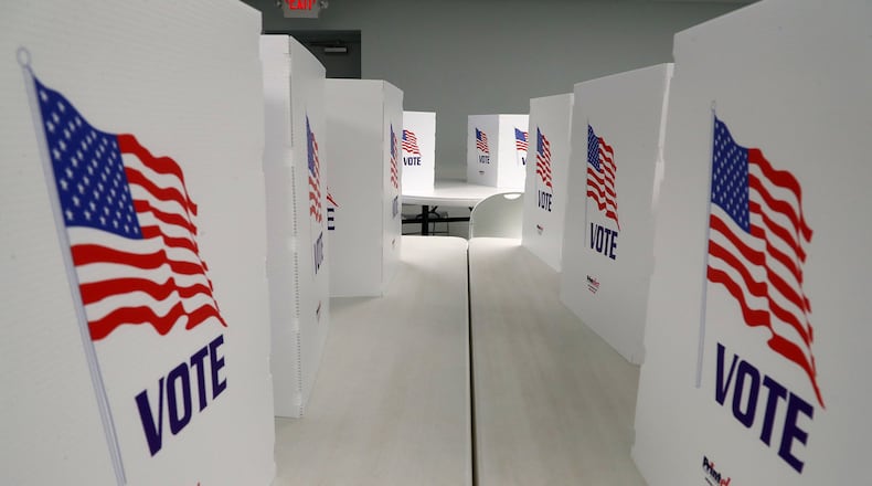 Voters in Urbana’s First Ward gave Amy Jumper the early lead in the race for the seat against Charles Moody in Tuesday’s primary election. BILL LACKEY/STAFF