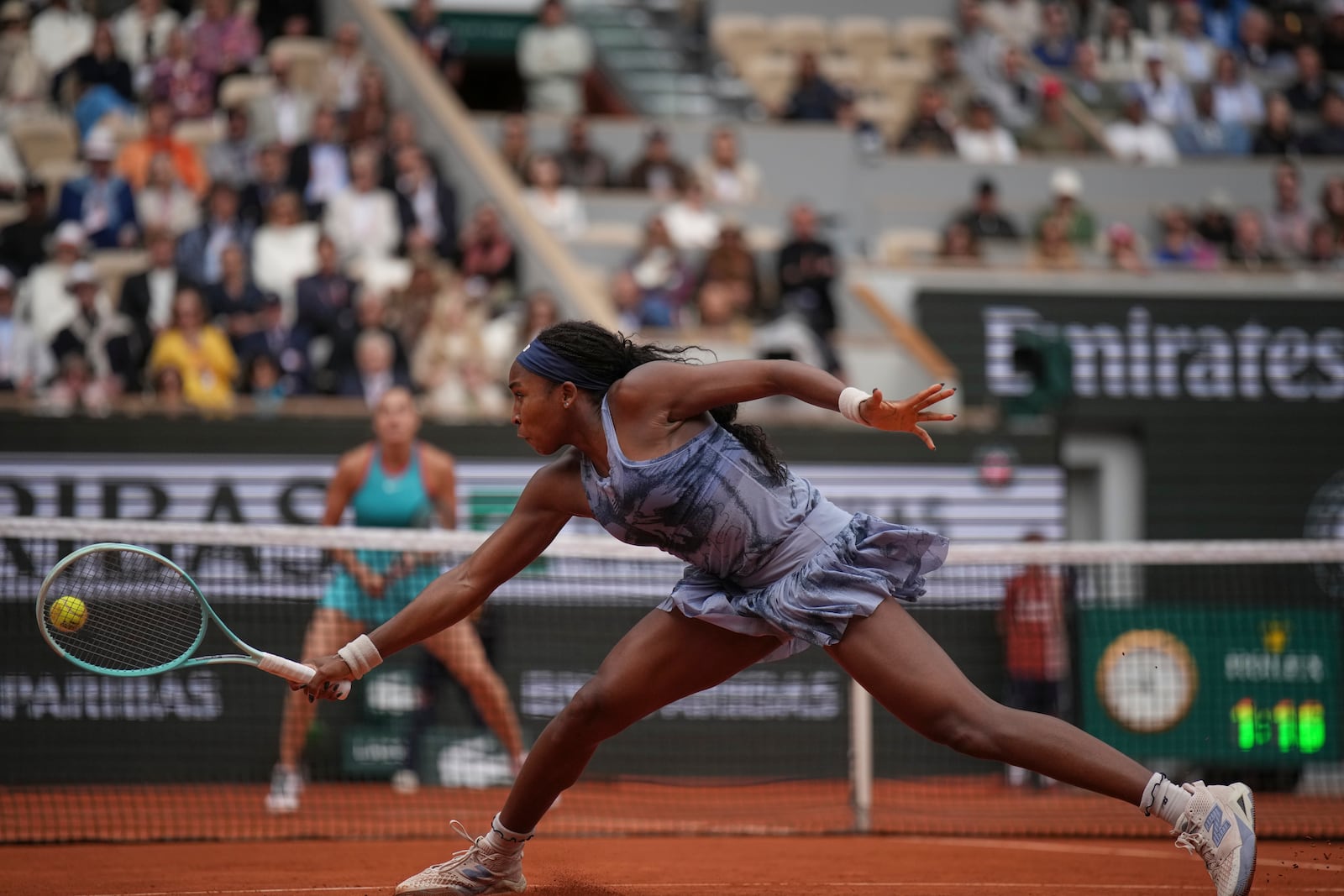 Coco Gauff of the U.S. plays a shot against Aryna Sabalenka of Belarus during their final match of the French Tennis Open at the Roland-Garros stadium in Paris, Saturday, June 7, 2025. (AP Photo/Christophe Ena)