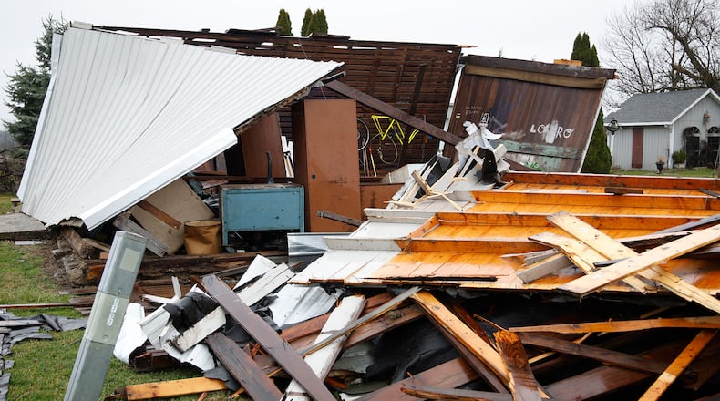 A barn is in pieces along Beard Road in Clark County Wednesday, March 6, 2024 a week after an E-F2 tornado ripped through the area. BILL LACKEY/STAFF