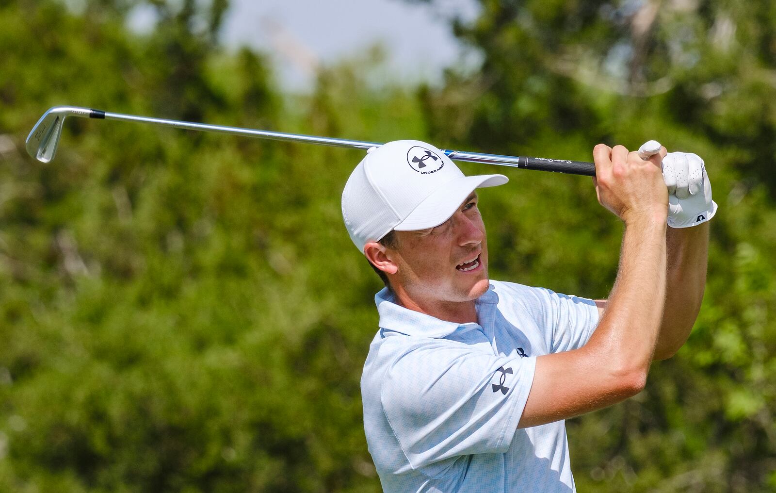 Jordan Spieth watches his shot on the 13th hole during the first round of the Texas Open golf tournament, Thursday, April 3, 2025, in San Antonio, Texas. (AP Photos/Rodolfo Gonzalez)