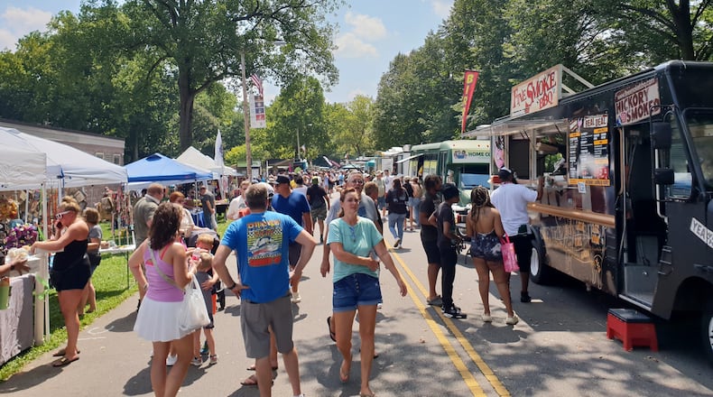 Crowds of people check out the food selections available at the 2025 Springfield Gourmet Food Truck Competition over the weekend. Organized by the Springfield Rotary, the event in its 11th year bringing more than two dozen food trucks from across the region to go head-to-head at Veteran’s Park. CONTRIBUTED