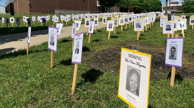 Posters of Ohio's missing adults and children assembled on the lawn of Wright State University, Saturday May 17, 2025 in recognition of MIssing Persons Day. LONDON BISHOP/STAFF