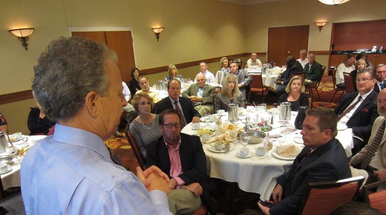 Consultant Willam F. Hutter answers questions Friday during a presentation about the Patient Protection and Affordable Care Act at the Courtyard by Marriott, Downtown Springfield. Staff/Tom Stafford