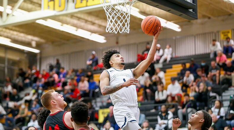 Springfield High School junior Tyron Barnes drives to the hoop during their game against Wayne on Monday, Feb. 21 at Centerville High School. CONTRIBUTED PHOTO BY MICHAEL COOPER