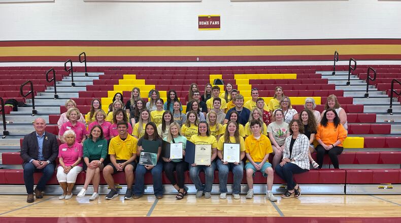 The Breast Cancer Endowment Fund of Clark/Champaign Counties board; county officials; representatives of OHSAA; and FFA Boosters recognized students, FFA members, athletic boosters and staff at Northeastern High School for their commitment to the community and raising a 10-year total of $106,000 through the annual Powder Puff flag football game. Contributed