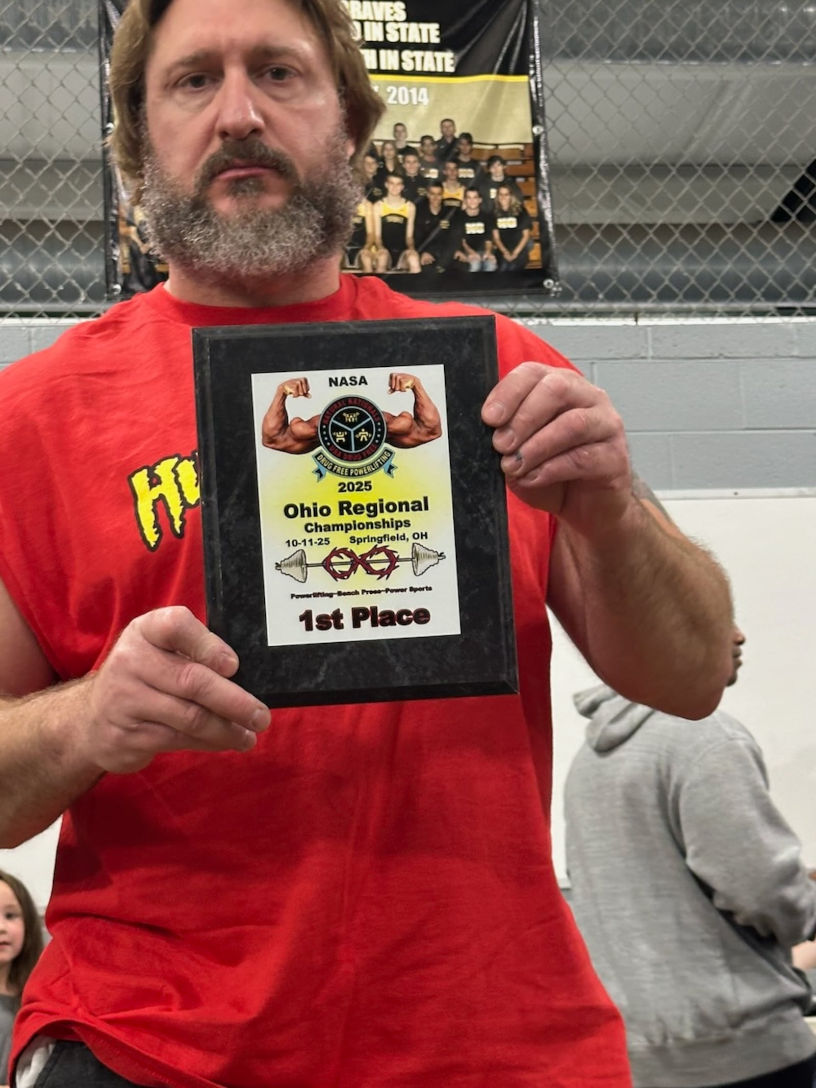 Ron Shotts, of Springfield, shows off a Natural Athlete Strength Association plaque in 2025. CONTRIBUTED PHOTO