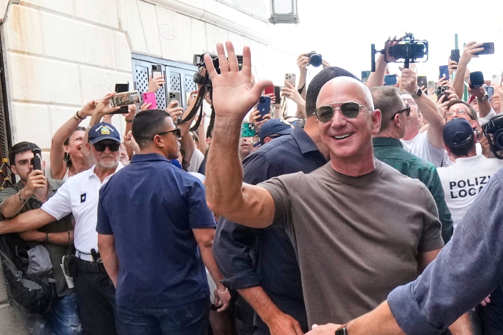 Jeff Bezos leaveS the Harry's Bar in Venice, Italy, Saturday,June 28, 2025, the day after his wedding with Lauren Sanchez Bezos. (AP Photo/Luca Bruno)