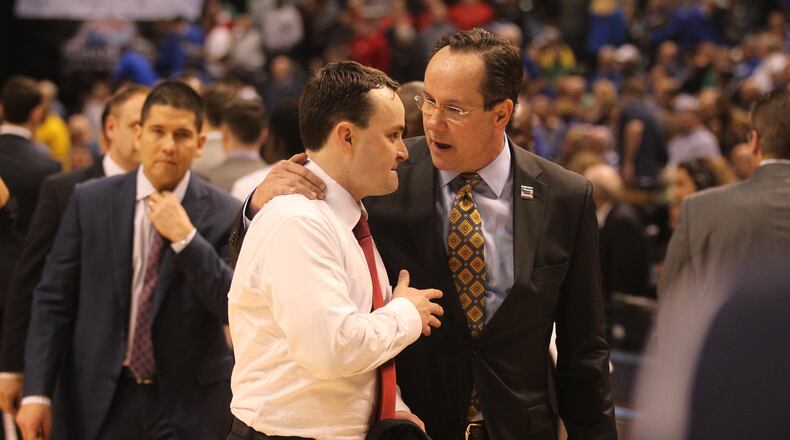Dayton’s Archie Miller and Wichita State’s Gregg Marshall talk after a NCAA tournament game on Friday, March 17, 2017, at Bankers Life Fieldhouse in Indianpolis. David Jablonski/Staff
