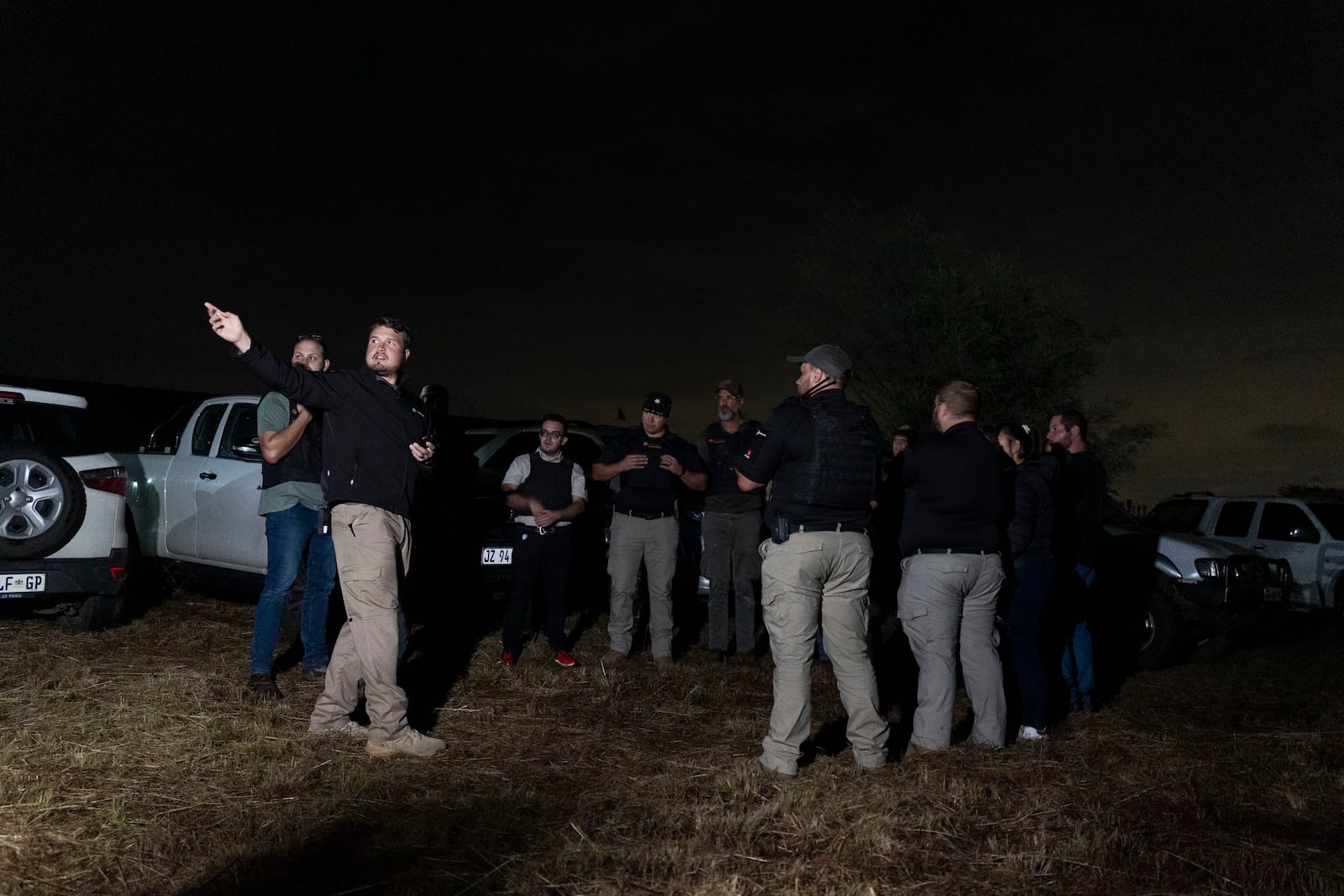 Members of Afriforum, a neighborhood and farm security group, assemble before a patrol in Bashewa area in the east of Pretoria, South Africa, Thursday, March 29, 2025. (AP Photo/Alet Pretorius)