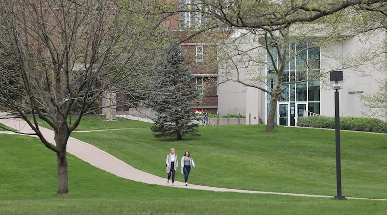 Wittenberg University students walk across campus. BILL LACKEY/STAFF