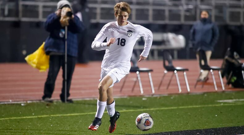 Greenon High School senior Jaden Journell dribbles the ball during a Division III District final match against Botkins at Bellefontaine High School last October. Journell scored 18 goals for the Knights a year ago. CONTRIBUTED PHOTO BY MICHAEL COOPER
