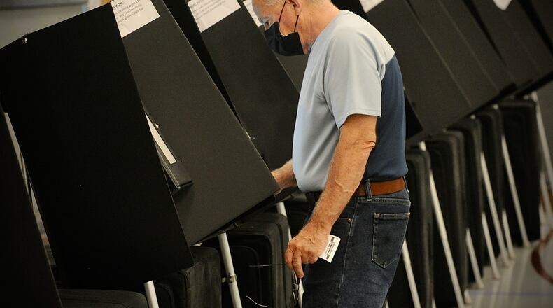 Rich Katulak votes Tuesday, Aug. 2, 2022 at the Xenia Grace Chapel in Greene County. MARSHALL GORBY \STAFF