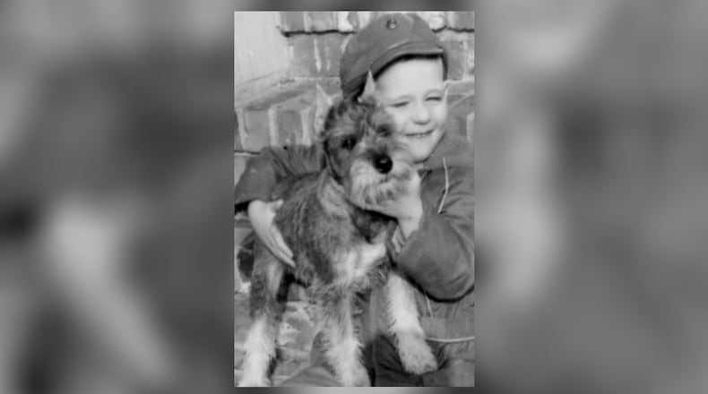 A very young Ed with his puppy, Fritz. CONTRIBUTED