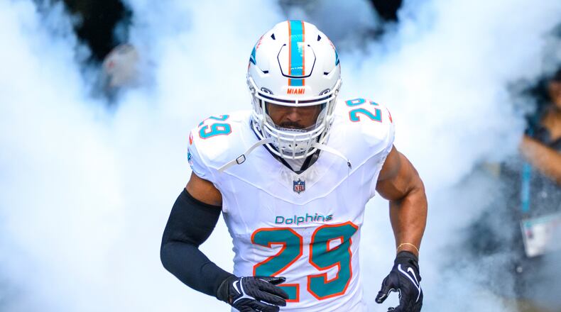 FILE - Miami Dolphins safety Minkah Fitzpatrick runs onto the field during player introductions before an NFL football game against the Buffalo Bills, Nov. 9, 2025, in Miami Gardens, Fla. (AP Photo/Doug Murray)