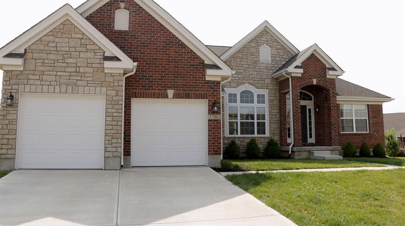Sliding patio doors open out to the composite balcony deck with built-in storage underneath. The split floor plan ranch is on a full unfinished basement which has daylight windows and is plumbed for a bath. Kathy Tyler/CONTRIBUTED