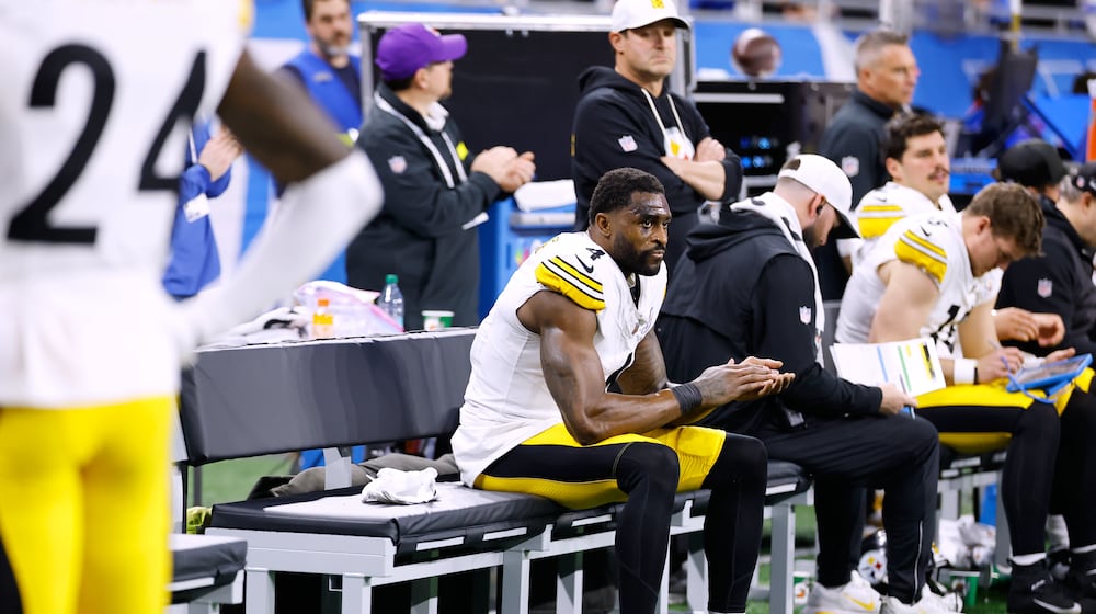 Pittsburgh Steelers' DK Metcalf sits on the bench during the second half of an NFL football game against the Detroit Lions, Sunday, Dec. 21, 2025, in Detroit. (AP Photo/Rey Del Rio)