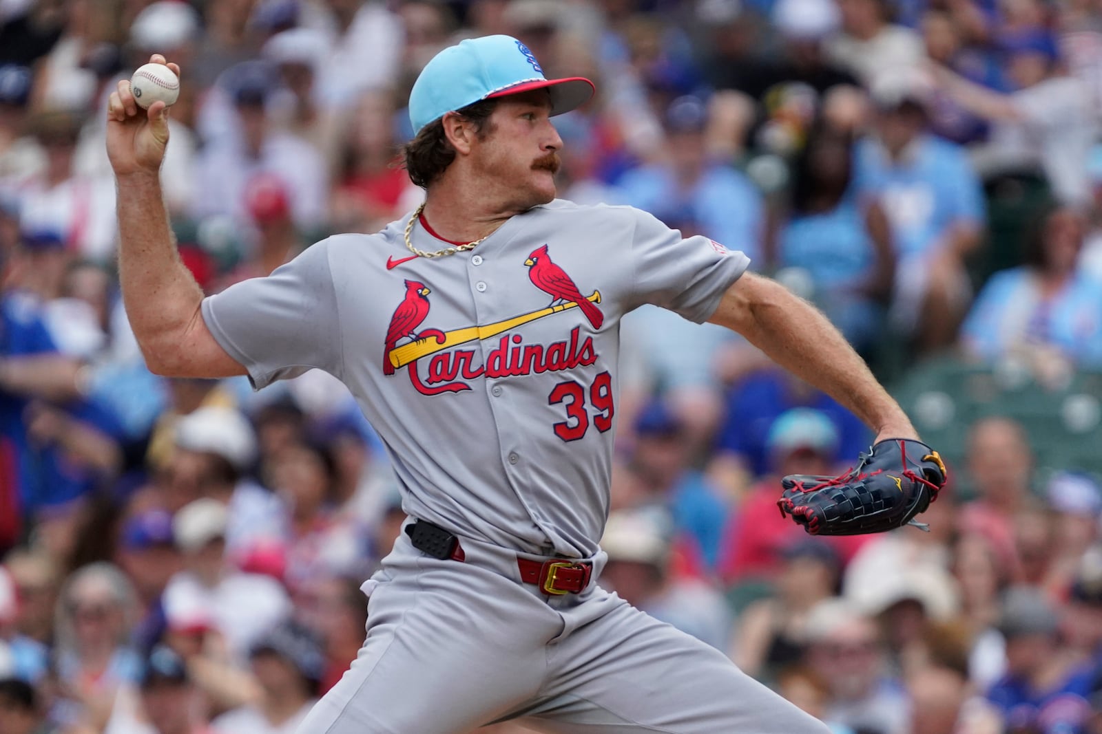 St. Louis Cardinals pitcher Miles Mikolas throws the ball against the Chicago Cubs during the first inning of a baseball game Friday, July 4, 2025, in Chicago. (AP Photo/David Banks)