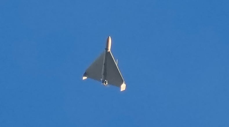 FILE - An Iranian Shahed exploding drone launched by Russia flies through the sky seconds before it struck buildings in Kyiv, Ukraine, on Oct. 17, 2022. (AP Photo/Efrem Lukatsky, File)