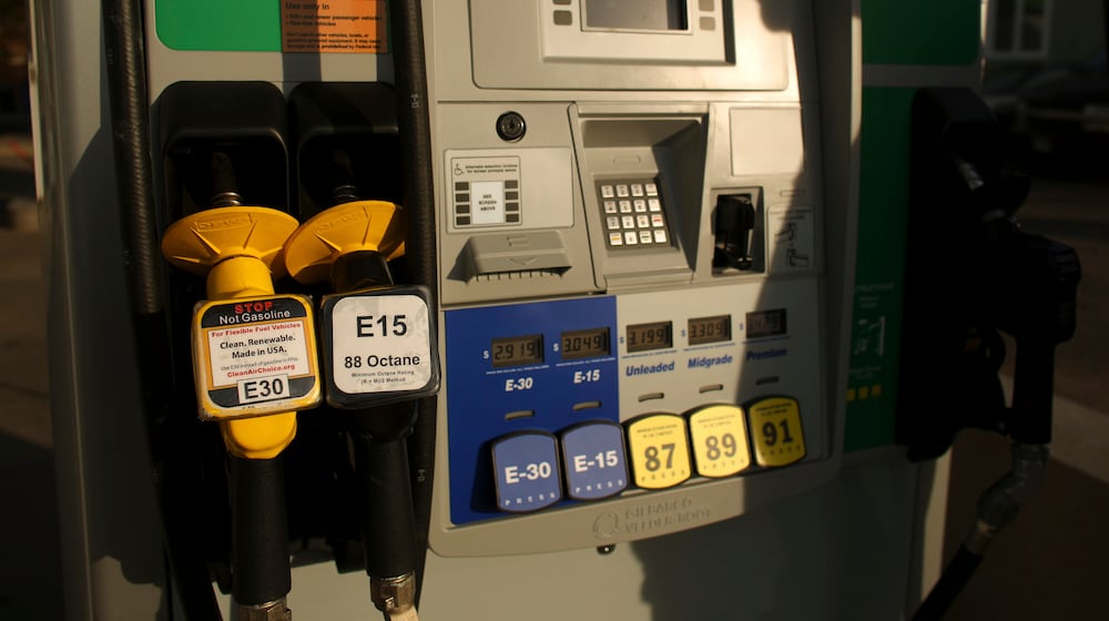 FILE - A shadow is reflected on new pumps at Rich Bohnen's service station in Minneapolis on Oct. 28, 2013. (Jeff Wheeler/Minnesota Star Tribune via AP)
