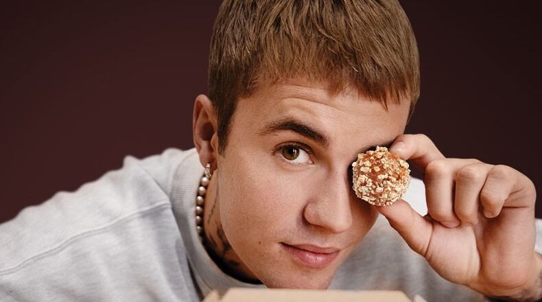 The new, limited-edition menu collaboration between Justin Bieber and Tim Hortons will first be available to customers on Nov. 29 with the launch of “Timbiebs Timbits” in Chocolate White Fudge, Sour Cream Chocolate Chip, and Birthday Cake Waffle flavors.