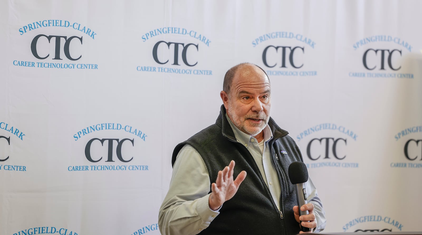 Unibilt Industries, Inc. president Greg Barney speaks during an event on Thursday, Feb. 26, 2026 that highlights a modular home built at Springfield-Clark CTC as part of a partnership with the Habitat for Humanity of Greater Dayton and Springfield-Clark CTC. JOSEPH COOKE/STAFF
