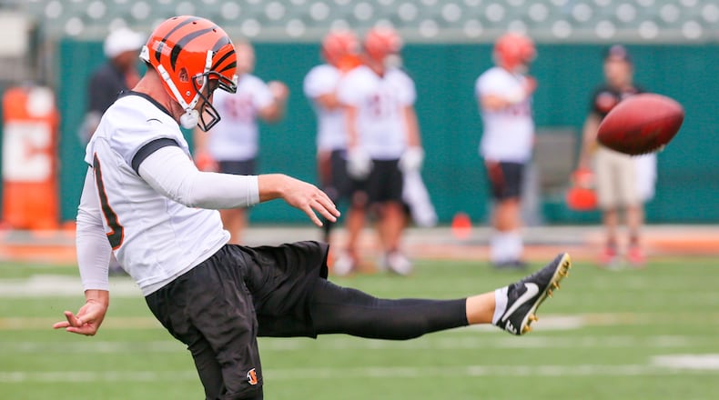 Bengals punter Kevin Huber (10) participates in a team practice at Paul Brown Stadium, Tuesday, June 13, 2017. GREG LYNCH / STAFF