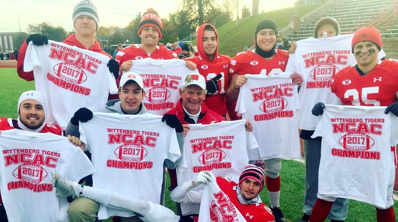 Wittenberg players pose for a photo after clinching the outright North Coast Athletic Conference championship with a victory over Wooster on Saturday, Nov. 11, 2017, at Edwards-Maurer Field in Springfield. Contributed photo
