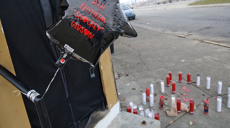 A memorial has been erected outside Club Hollywood on East Pleasant Street for Shyheim Gibson, who was shot and killed at the club last Thursday. BILL LACKEY/STAFF