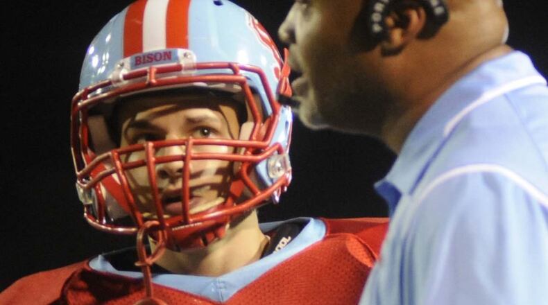 Earl White (right) has had the dual role of football coach/AD at Belmont since 2014. MARC PENDLETON / STAFF