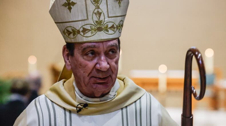 Archbishop Dennis Schnurr celebrates Mass at St. Charles in Kettering Wednesday morning, Jan. 31, 2024, to mark Catholic Schools Week. Schnurr heads the Archdicese of Cincinnati includes 19 Ohio counties and encompasses 109 Catholic elementary and high schools in the Dayton-Cincinnati area. JIM NOELKER/STAFF