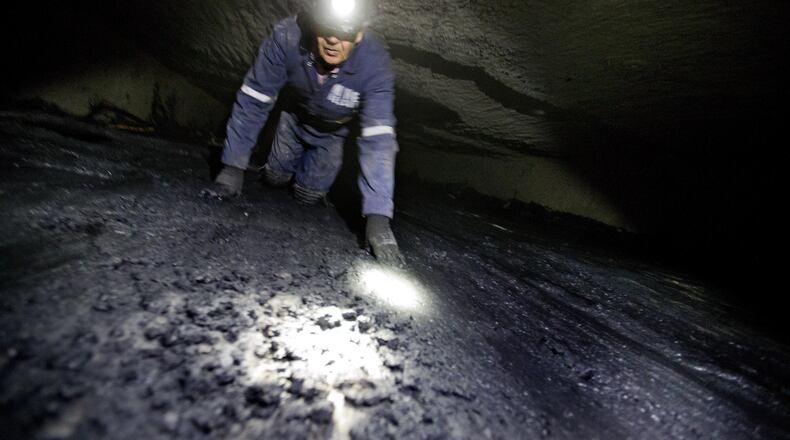 Nearly 100,000 coal miners are at risk of losing all or part of their pensions by 2022 — sooner if more coal companies declare bankruptcy. (AP Photo/David Goldman)