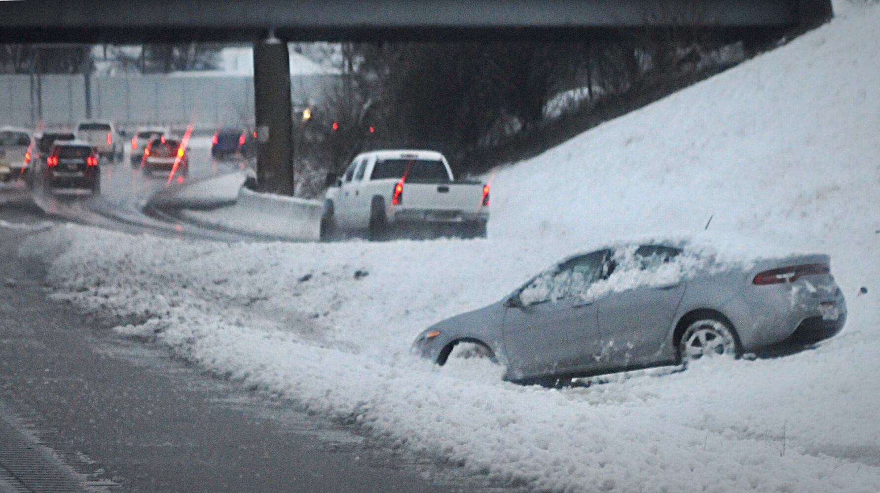 Snow, and rain slam Miami Valley: PHOTOS