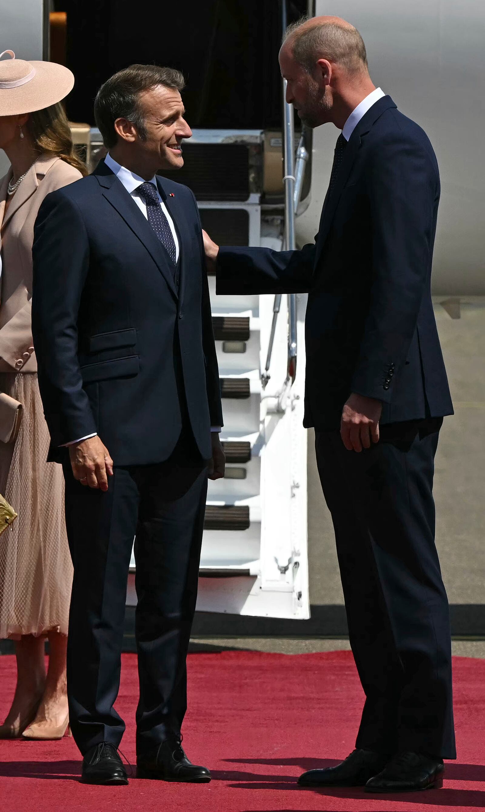 France's President Emmanuel Macron, with his wife Brigitte Macron, are greeted by Britain's Prince William, right, and Kate, Princess of Wales at RAF Northolt, west of London, Tuesday July 8, 2025, on the first day of a three-day state visit to Britain. (Justin Tallis/Pool via AP)