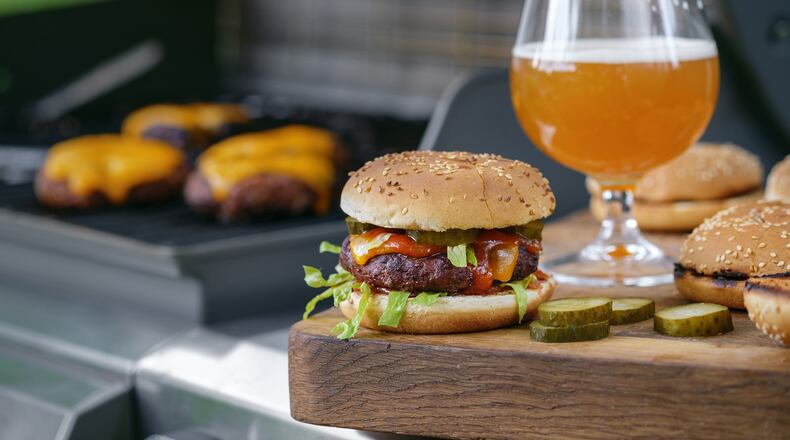 Burger and beer are the perfect pairing for Fourth of July cookouts. CONTRIBUTED