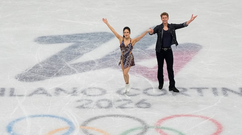 Madison Chock and Evan Bates of the United States compete during the figure skating ice dance team event at the 2026 Winter Olympics, in Milan, Italy, Friday, Feb. 6, 2026. (AP Photo/Ashley Landis)