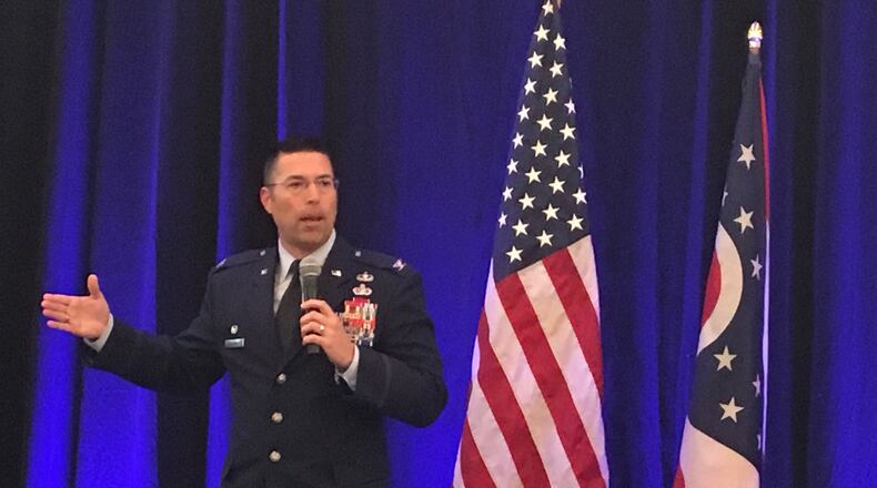 Col. Tom Sherman, commander of the 88th Air Base Wing at Wright-Patterson Air Force Base, speaks at a defense conference in Columbus on Monday. Sherman said that the base’s mission and responsibilities are growing and that he expects its number of employees to continue growing as well.