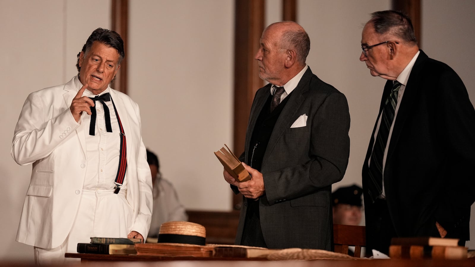 Larry Jones, who portrays William Jennings Bryan, left, rehearses with other actors in the play "Destiny in Dayton", July 8, 2025, in Dayton, Tenn. (AP Photo/Mike Stewart)