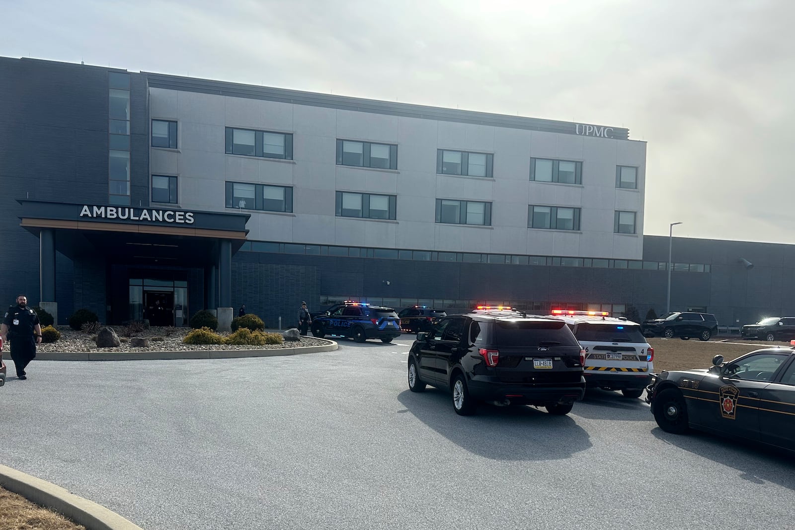 FILE - Law enforcement arrive at the scene of a shooting at UPMC Memorial Hospital in York, Pa., Feb. 22, 2025. (AP Photo/Mark Scolforo, File)