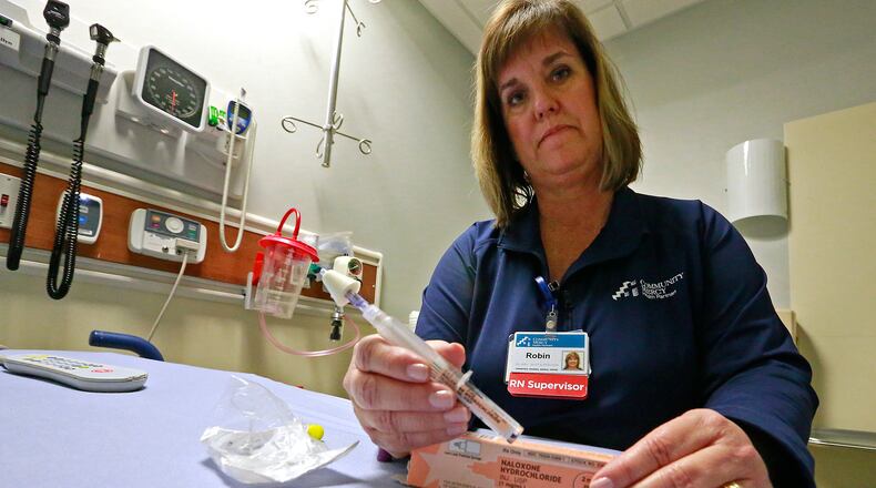Robin Chadeayne, an RN supervisor in the Springfield Regional Medical Center Emergecy Department, says administering Narcan for a drug overdose has become a common occurance. Bill Lackey/Staff