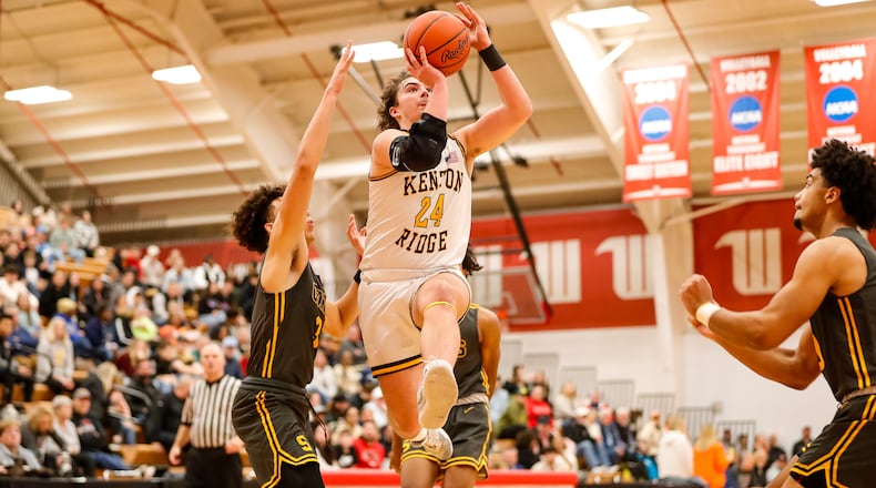 Kenton Ridge senior Logan Fyffe drives to the hoop during their game against Springfield earlier this season at Wittenberg University. Michael Cooper/CONTRIBUTED