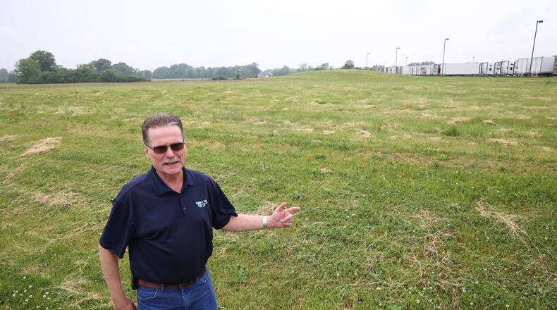 John Maurer, from Esterline & Sons Manufacturing, describes what the company's new location at Airpark Ohio will look like.  BILL LACKEY/STAFF