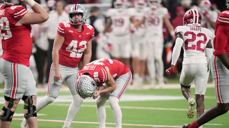 Ohio State kicker Jayden Fielding racts after missing a field goal during the second half of the Big Ten championship NCAA college football game against Indiana in Indianapolis, Saturday, Dec. 6, 2025. (AP Photo/AJ Mast)